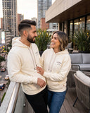 Buzo Unisex con Capota Marfil Palmera Escudo